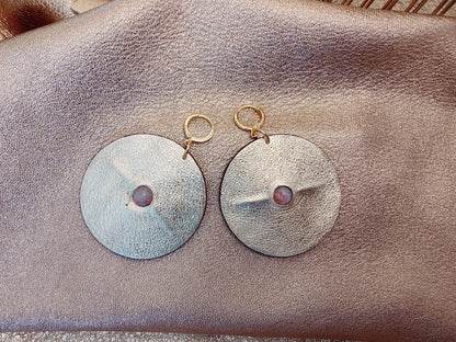 Large leather earring - In the center